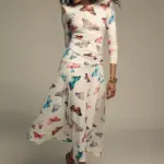 Vestido elegante mujer con silueta estructurada y detalles sofisticados. Ideal para eventos y looks de invitada primavera verano.